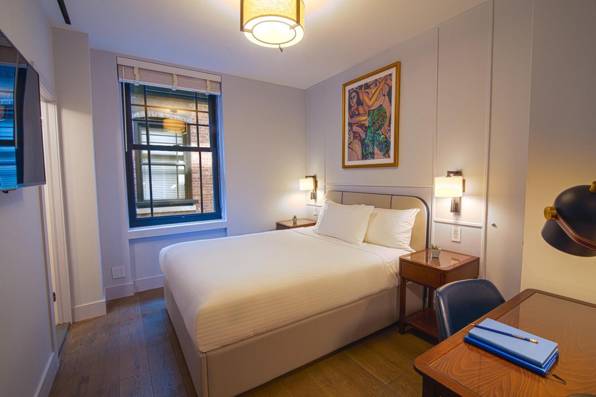 Deluxe Kamer met 1 Queensize Bed - Geschikt voor Gasten met een Lichamelijke Beperking